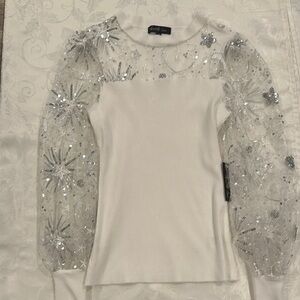 White long sleeve blouse with detailed sleeves